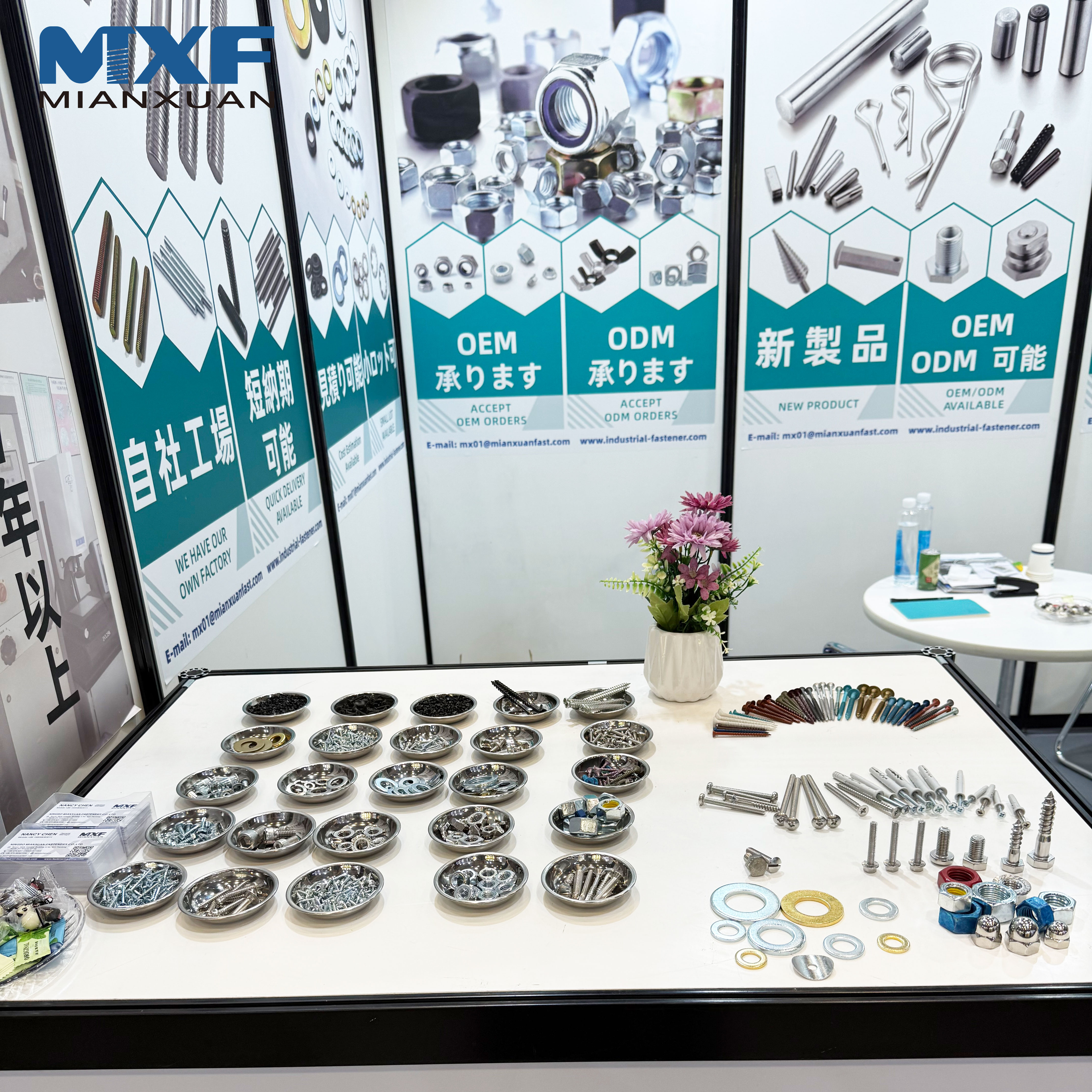 High-quality hex bolts, nuts, and washers displayed by Mianxuan Fasteners at Tokyo trade show